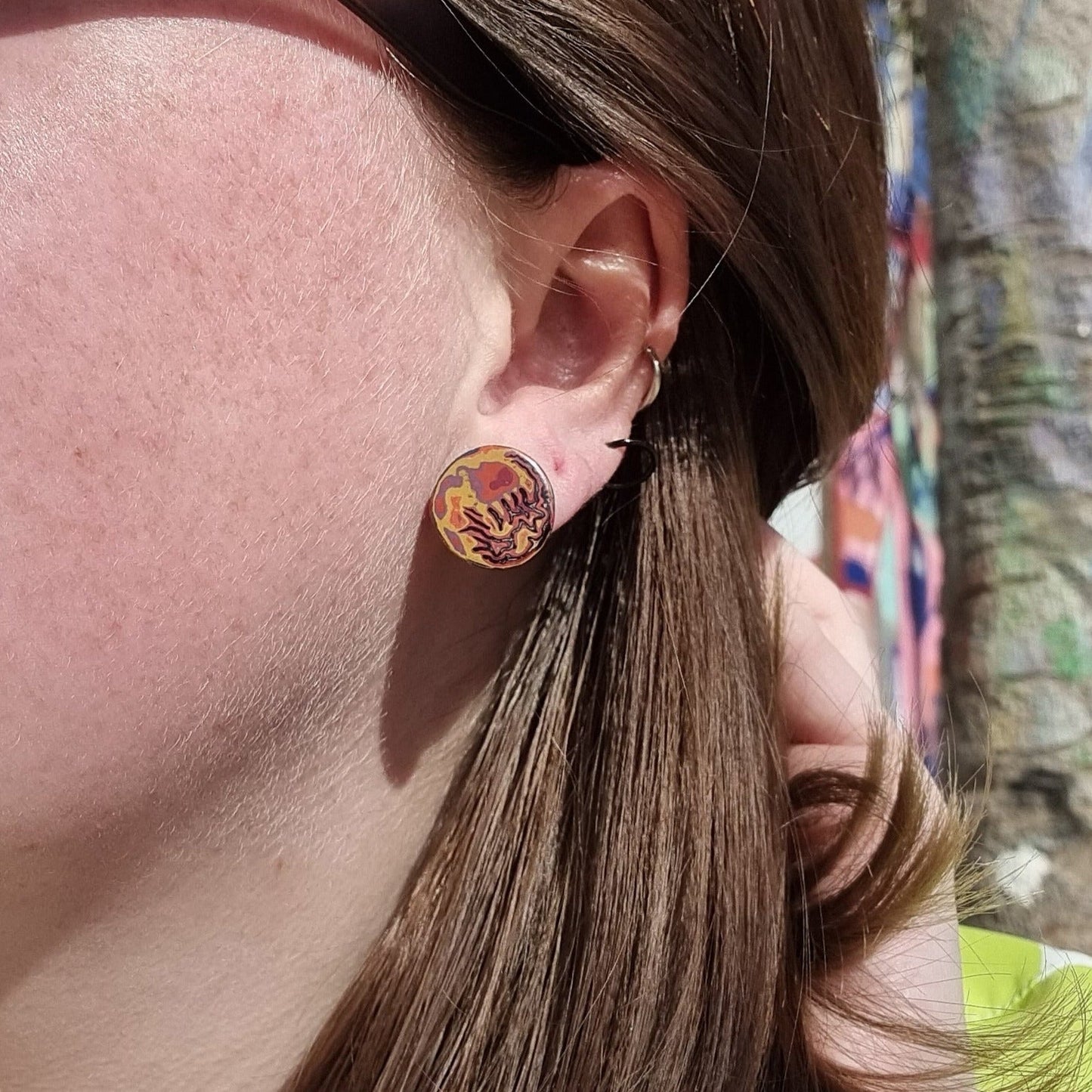 Mini Tambo stud earring in reds and pink