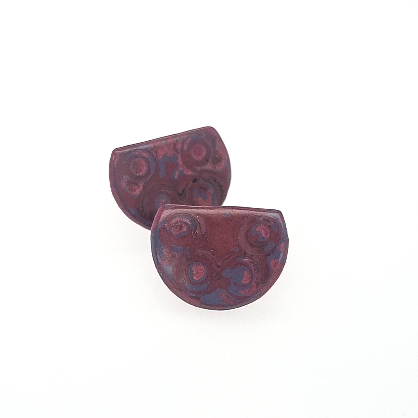 Mini half Tambo stud earring in reds and pinks.