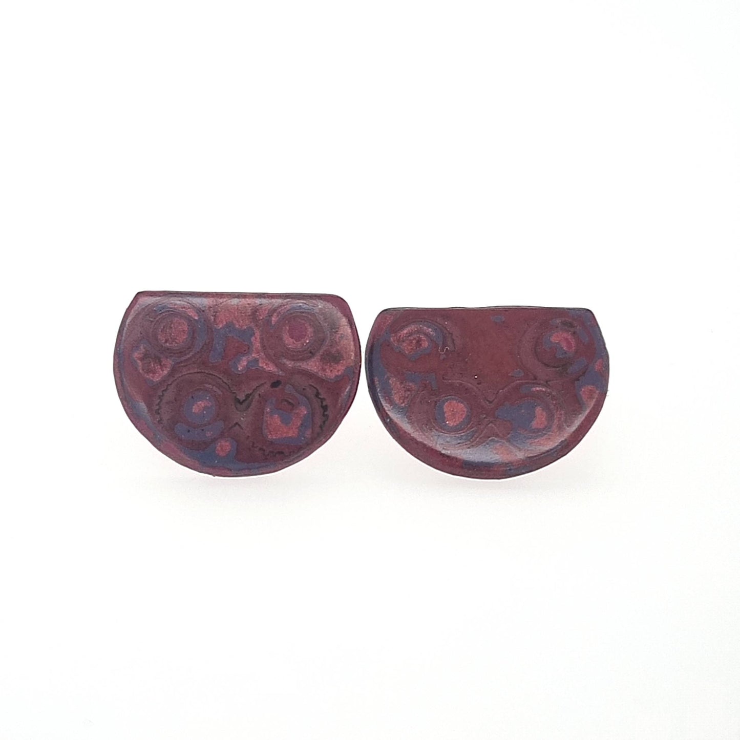 Mini half Tambo stud earring in reds and pinks.