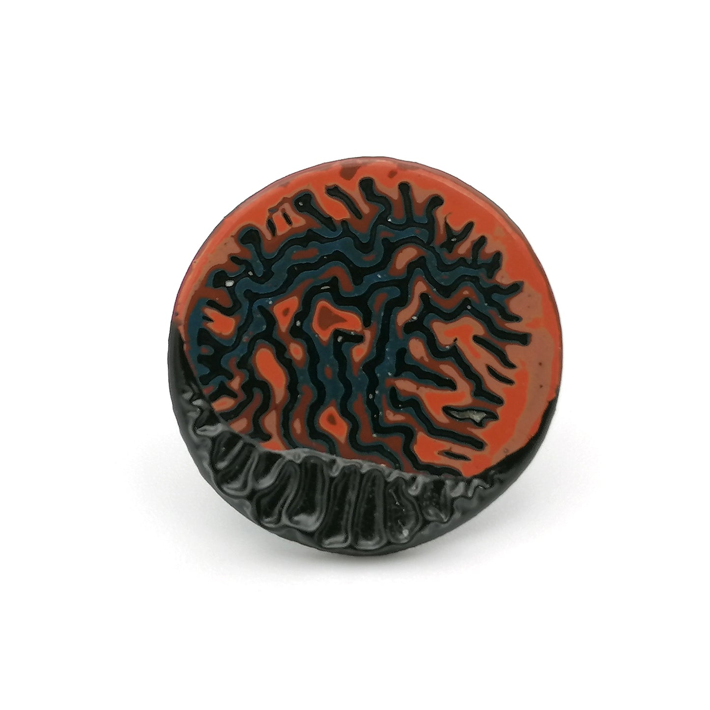 Image shows a single circle stud earring on a white background. With a wrinkled pattern in orange, blue and red and a raised black winkle textured rim.
