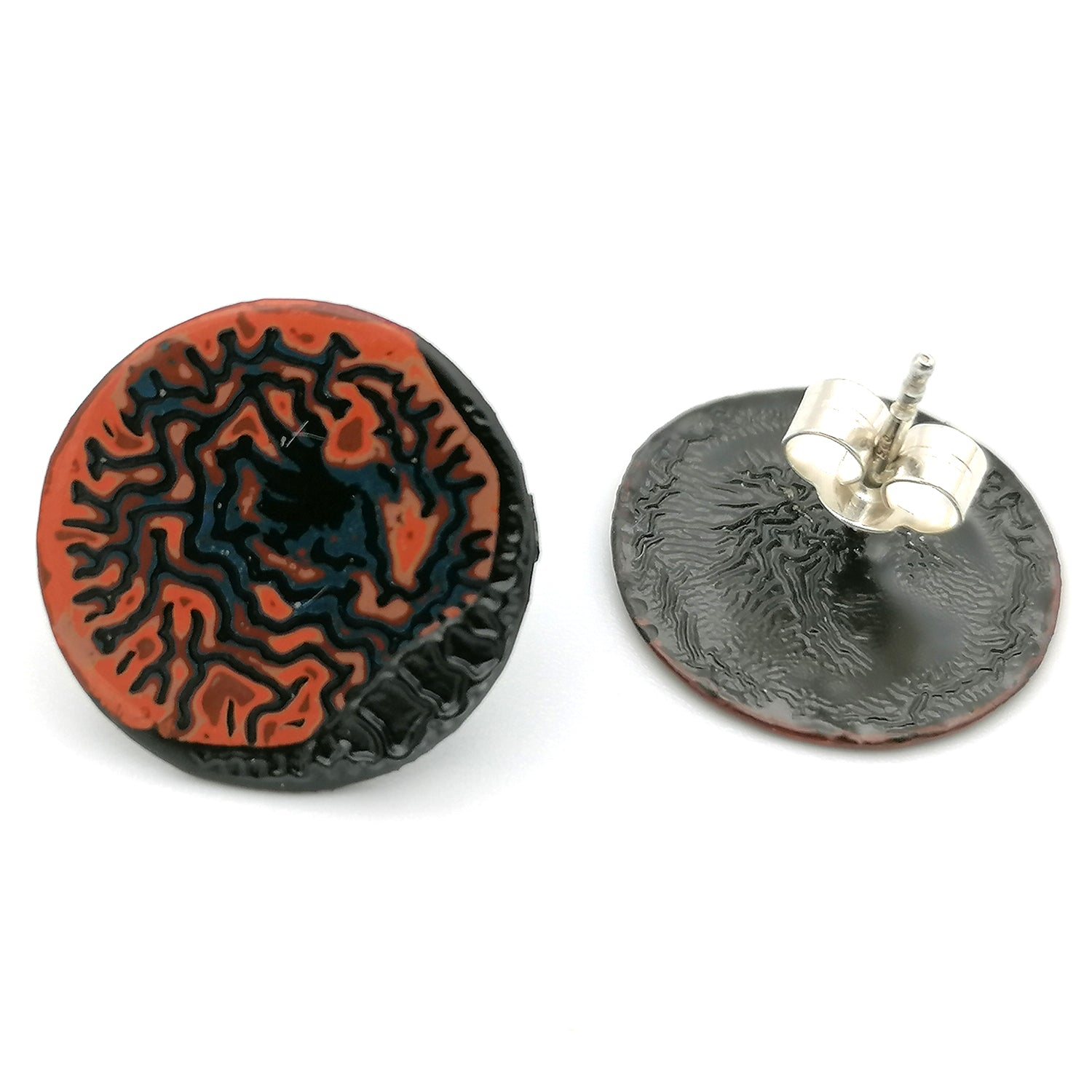 Image shows a pair of circle stud earrings on a white background, the second of which is upside down showing the sterling silver earring post. With a wrinkled pattern in orange, blue and red and a raised black winkle textured rim.